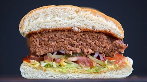 Getty Images A cross-section of a vegan burger (Credit: Getty Images)