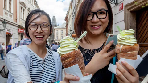 Alamy Origin aside, people seem to love eating trdelník (Credit: Alamy)