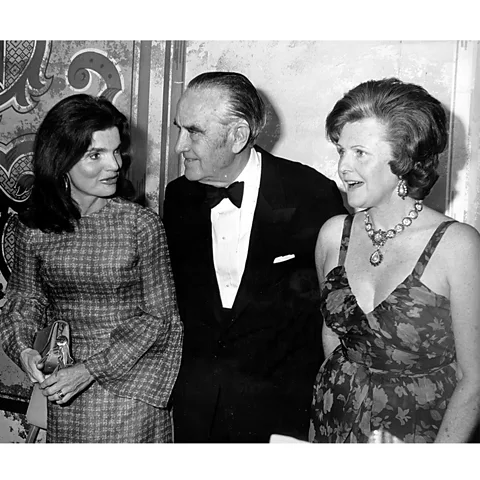 Getty Images In the 1970s, Harriman – shown here with her husband Averell and Jackie Onassis – was at the centre of an elite New York social set (Credit: Getty Images)