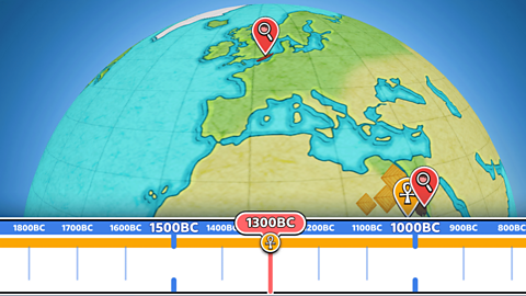 A large section of a world globe showing parts of Europe and Africa and a timeline at the bottom, the gauge points to thirteen hundred BC