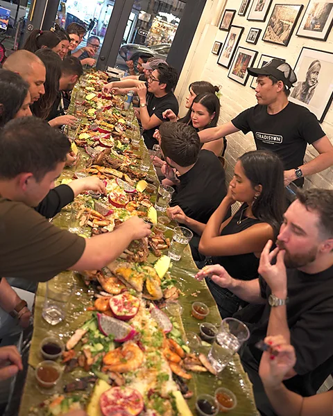 Darryl Laiu/ BBC Kamayan-style feasts are increasingly offered in Filipino restaurants – sometimes feeding upwards of 20 people (Credit: Darryl Laiu/ BBC)