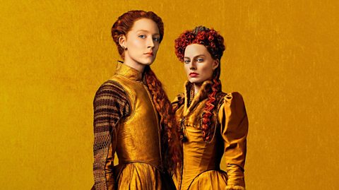 Saoirse Ronan as Mary Stuart and Margot Robbie as Elizabeth I, standing side by side, on yellow gold background.