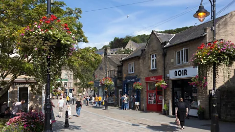 Alamy Many of Hebden Bridge's former mills have been converted to galleries and shops (Credit: Alamy)