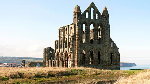 Alamy Whitby Abbey is a pilgrimage site for many horror fans due to its links to Dracula (Credit: Alamy)