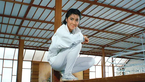 Eureka Entertainment Before she was embraced by Hollywood, Michelle Yeoh changed the face of cinema with her performances in Hong Kong action films (Credit: Eureka Entertainment)