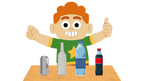 A young boy with a selection of different bottles
