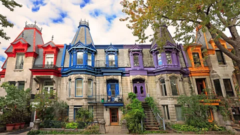 Getty Images Montreal's Plateau neighbourhood is home to brightly painted houses and Forgione's pick for a sublimely cross-cultural poutine (Credit: Getty Images)