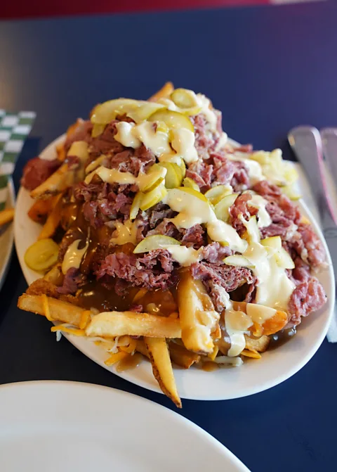 Getty Images Smoked meat is another quintessential Montreal food; even more delicious when topping a platter of piping hot poutine (Credit: Getty Images)