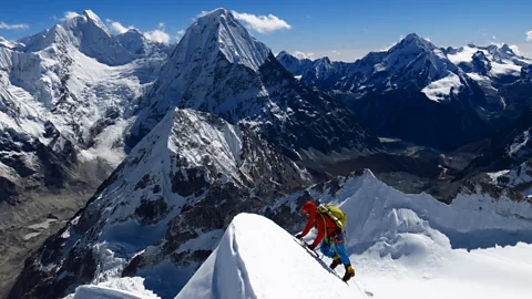 Hari Mix Hari Mix scaling a mountain in the Himalayas (Credit: Hari Mix)