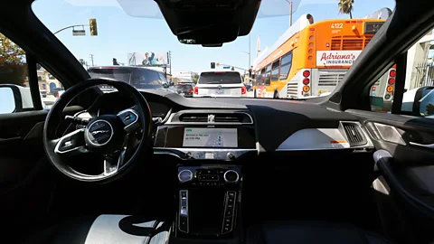 Getty Images Waymo’s cars have a typical car layout and feature a screen beside the steering wheel that displays what the car can see around it (Credit: Getty Images)