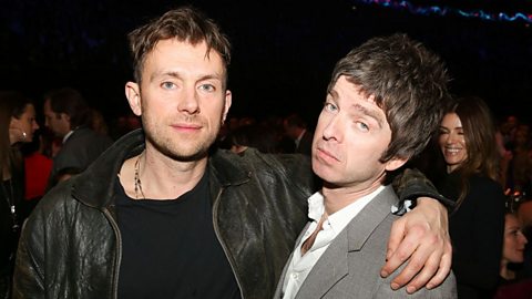 Noel Gallagher and Damon Albarn pose for a picture 