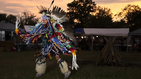 Getty Images Person performing a traditional dance at a Native American powwow at Queens Farm Museum (Credit: Getty Images)