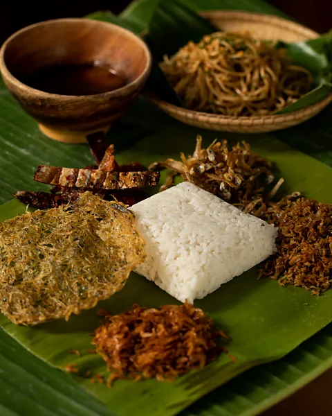 Geric Cruz Steamed rice is always served with a selection of salted and dried fish (Credit: Geric Cruz)