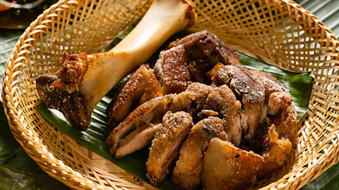 Dre Ferrer Pork is a beloved Filipino ingredient, and Navarra cooks the hock three times – boiled, fried and seared (Credit: Dre Ferrer)