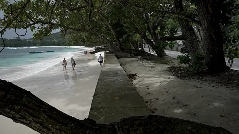 Getty Images The Seychelles is constructing sea walls to protect its residents from climate impacts (Credit: Getty Images)