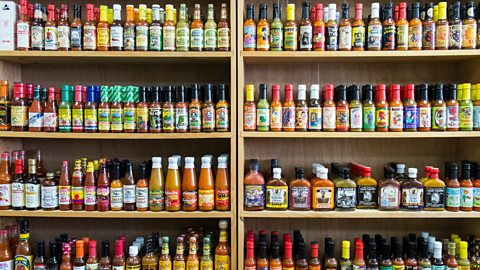 Shelves of hot sauces