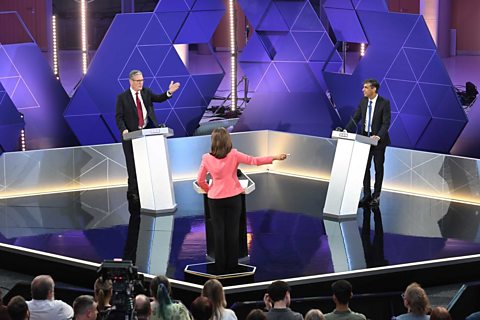 Starmer and Sunak debating on TV for the general election 2024.