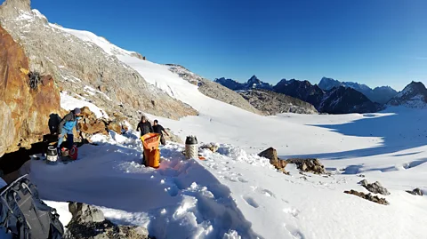 Marcel Cornelissen Swiss archaeologist Thomas Reitmaier and colleagues explore sites freed by a retreating glacier (Credit: Marcel Cornelissen)