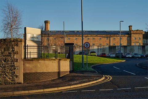 The front entrance of HMP Perth in winter sunlight.