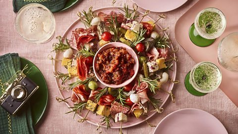 A charcuterie board in a wreath shape is perfect for Christmas