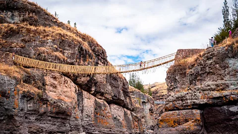 Alamy Some 200 grass-woven suspension bridges once spanned the cliffs of the Inca's Royal Road – today, only one remains (Credit: Alamy)