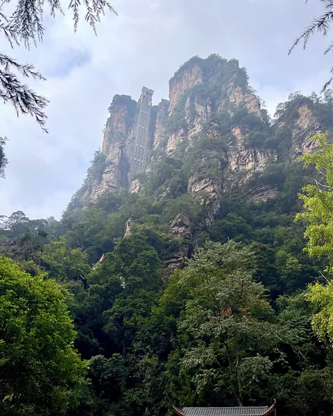 Charukesi Ramadurai The Bailong elevator built on a mountainside takes people up 326m in less than two minutes (Credit: Charukesi Ramadurai)