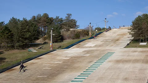 Alamy Dry slopes might be a way to help future-proof the sport as temperatures rise (Credit: Alamy)