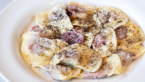 Getty Images Local cuisine in the Dolomites is hearty for refuelling after long days in the snow, like a hot dish of casunziei ravioli stuffed with potatoes and turnip (Credit: Getty Images)