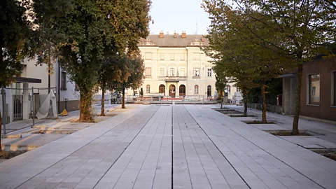 Primoz Korosec In Piazza Transalpina, tourists can have their photo taken standing half in Slovenia, half in Italy (Credit: Primoz Korosec)