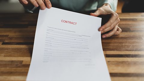 A recruitment contract with the word contract written in red