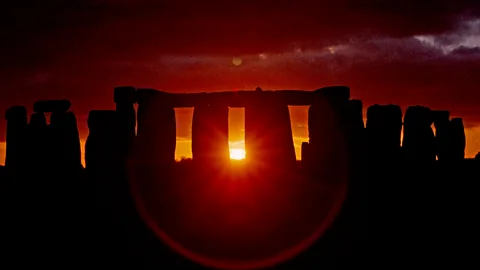 Mike Pitts The last glimpse of the Sun through Stonehenge before it falls below the horizon (Credit: Mike Pitts)