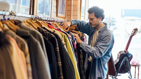 Getty Images Instead of buying fast fashion items, you could rent clothes or switch to second-hand clothes from thrift stores (Credit: Getty Images)