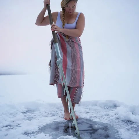 Taneli Kantanen For an icy wild swim, Mäkinen heads to Isokenkäisten Klubi wilderness lodge (Credit: Taneli Kantanen)