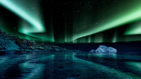 Alamy The northern lights in Greenland (Credit: Getty Images)