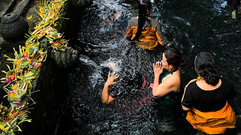 Getty Images Tirtha Empul is a 1,000-year-old water temple that's attracting travellers in droves (Credit: Getty Images)