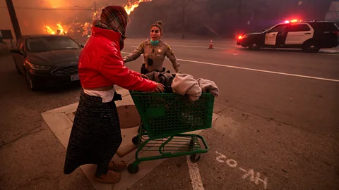 Getty Images The authorities in LA have prioritised getting people to safety as the flames have closed in (Credit: Getty Images)