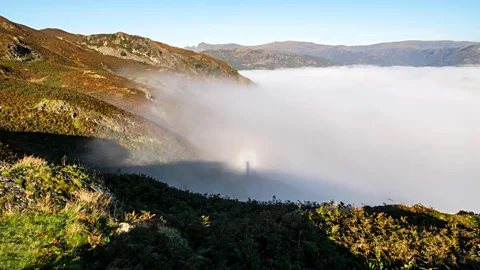 Getty Images A Brocken spectre is a large shadow of an observer cast onto cloud or mist (Credit: Getty Images)