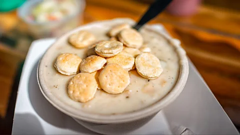 Alamy It's customary for restaurants in Boston to serve New England clam chowder with a handful of crunchy oyster crackers on top (Credit: Alamy)