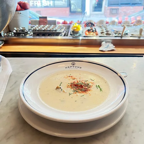 Andrea E McHugh Even clam chowder can feel romantic when it's eaten at Neptune Oyster, an eatery modelled after classic Parisian oyster bars (Credit: Andrea E McHugh)