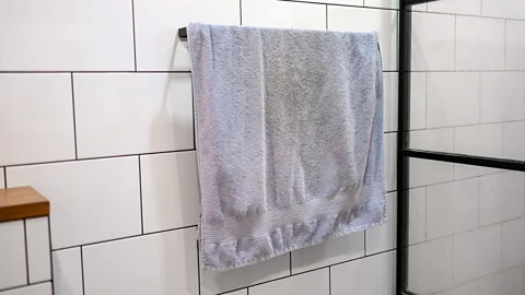 Getty Images A dirty towel hanging in a bathroom (Credit: Getty Images)