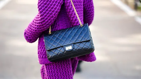 Getty Images The Chanel 2.55 was the first It bag – created in 1955 by Coco Chanel, its shoulder chain was a revolutionary innovation (Credit: Getty Images)