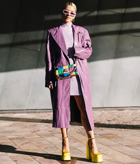 Getty Images Rotate by Birger Christensen's bright lavender coat epitomizes cozy Scandinavian style (Credit: Getty Images)