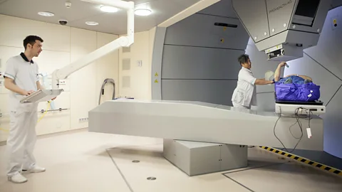 Getty Images Proton therapy can be more precisely targeted at cancers, leading to less damage to healthy tissues (Credit: Getty Images)