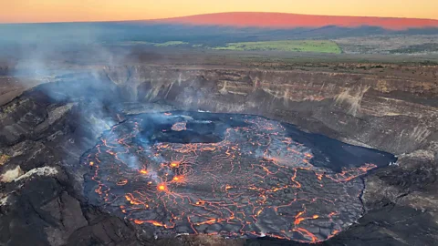 Alamy The view from the Hale'mau'mau Crater overlook at sunset is one of Carrere's favourite magical sights in Hawaii (Credit: Alamy)