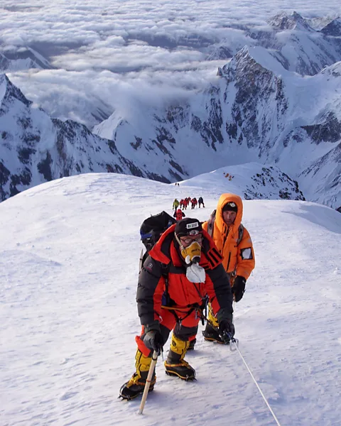 Lars Nessa Climbers on K2 enlist the guidance of porters from nearby Pakistan and Nepal (Credit: Lars Nessa)