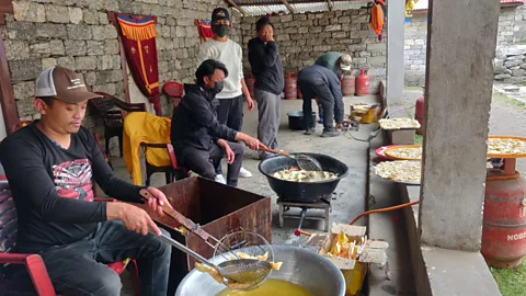 Ridhi Agrawal Making khapse is a communal activity that takes place ahead of Losar (Credit: Ridhi Agrawal)