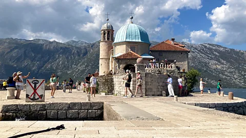 Lizzie Enfield The church of Our Lady of the Rock is nestled on a small, man-made islet in the tranquil waters of Kotor Bay, Montenegro (Credit: Lizzie Enfield)