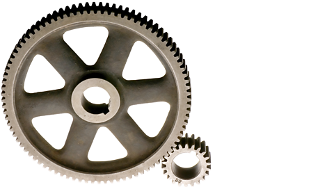 Two metal gears of different sizes connected to create a meshed gear mechanism