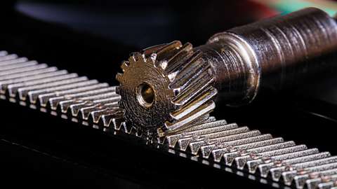 Close up of a linear Rack gear with a pinion gear