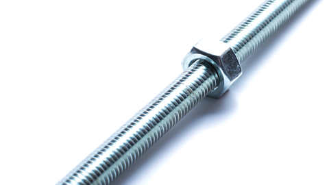 Threaded bar with nut on white background